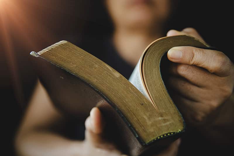 woman holding bible